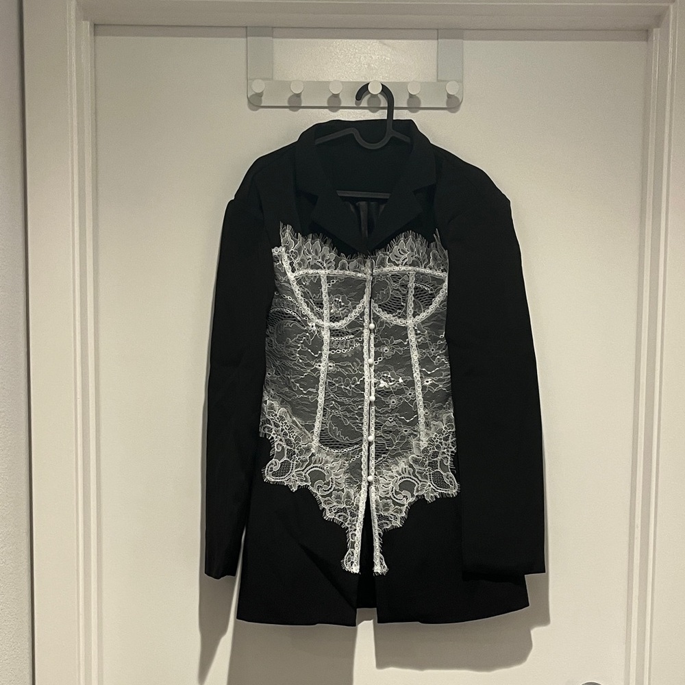Chic Black Blazer with White Lace Detail